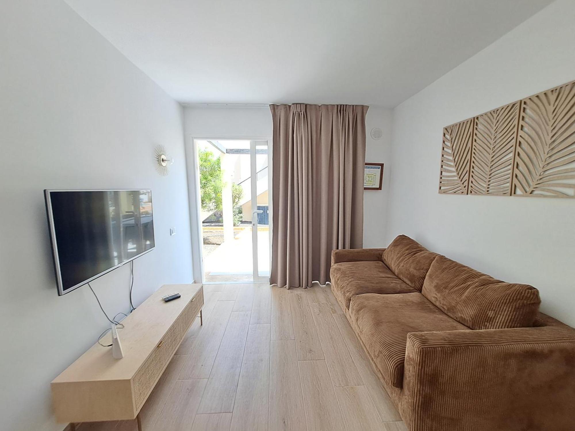 Apartamento con terraza y piscina en Corralejo Exterior foto